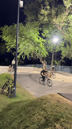 Night riding at an Almaty bike park with jumps and fresh paths