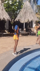 Resort guests enjoy sunny afternoon at Porlamar pool area