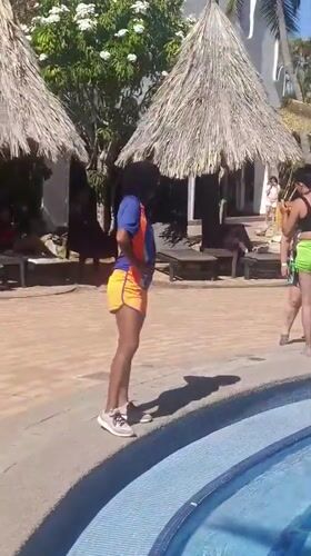 Resort guests enjoy sunny afternoon at Porlamar pool area