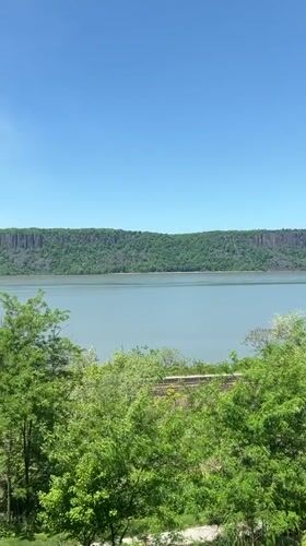 Peaceful waterfront scene captured in Yonkers under clear skies