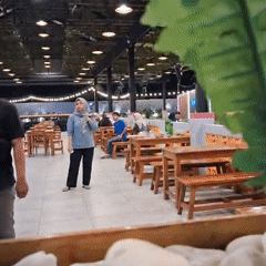 Lunchtime at a lively casual restaurant in Jambi