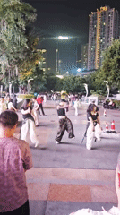Street performers dance and cosplay in Liangjiang public spaces