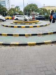 Morning scenes across a Banjarmasin roundabout, construction site, and hospital