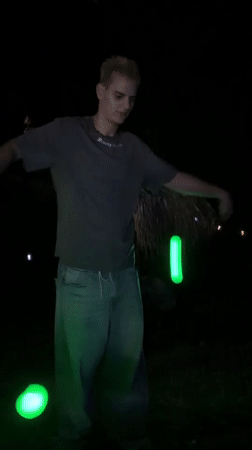 Glowing props light up a night juggling session in Zgorigrad