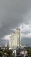 Morning observations of overcast Pattaya cityscape and mango breakfast