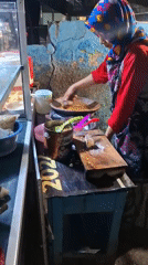 Street food prep at a Bojonegoro stall, mid-afternoon.