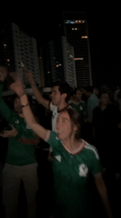 Mexico fans celebrate in the streets of Tlaxcalancingo at night