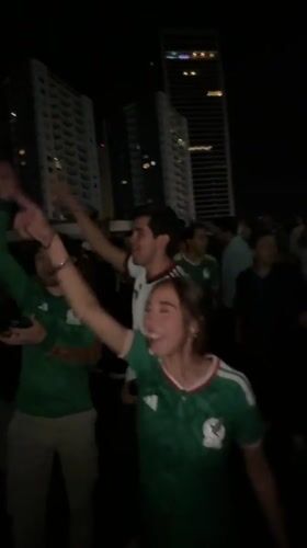 Mexico fans celebrate in the streets of Tlaxcalancingo at night