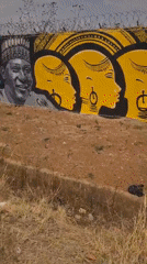 Street art murals documented near Nigerian bakery in Barakin Lerawi