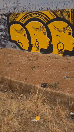 Street art murals documented near Nigerian bakery in Barakin Lerawi