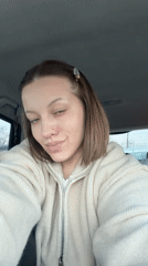 Woman observed in car in Reshetnikovo, Russia