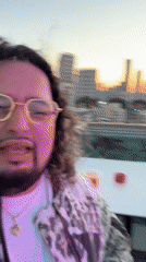 Man Films Selfie Video on Ramat Gan Rooftop at Sunset