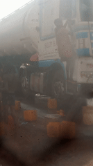 Truck washing crew cleans SALOP HAUL tanker in Nigeria