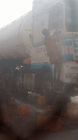 Truck washing crew cleans SALOP HAUL tanker in Nigeria