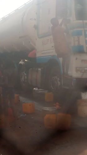 Truck washing crew cleans SALOP HAUL tanker in Nigeria