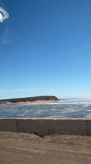 Driver captures scenic frozen waterway during morning commute in Chaikovsky