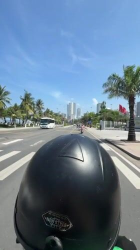Morning motorcycle ride captured in Nha Trang, Vietnam