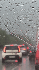 Sitting in rainy Moscow traffic, windshield streaked with drops