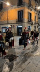 Roman soldier procession drums through Barcelona streets