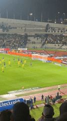 Rainy night soccer match draws cheering crowds in Mexico City