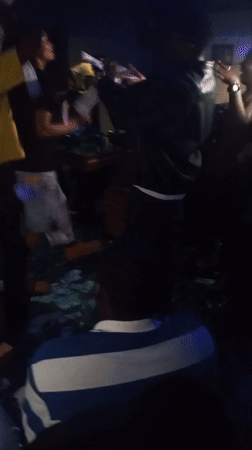 Nightclub celebration with cash throwing documented in Lokoja, Nigeria