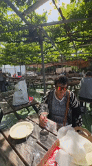 Morning vineyard dining captured in Mate Yehuda, Israel
