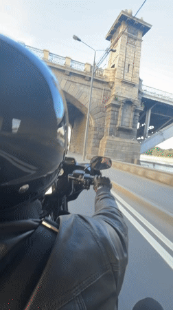 Motorcycle and Mercedes on Moscow streets, evening ride
