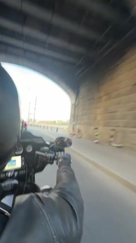 Motorcycle and Mercedes on Moscow streets, evening ride