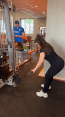 Woman exercises, takes mirror selfies at Russian gym