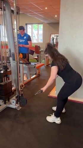 Woman exercises, takes mirror selfies at Russian gym