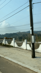 Morning drive through landscaped Bo Y reveals ornate fencing