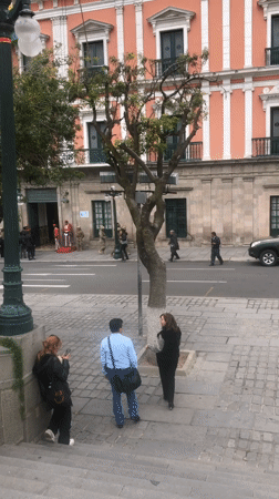 Media gathering outside government buildings in La Paz