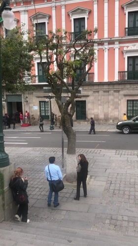 Media gathering outside government buildings in La Paz