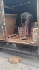 Street life and a beverage delivery in Yenagoa, Nigeria