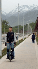 Unicyclist and duck share waterway path in Almaty