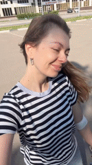 Woman takes morning selfie videos in Khimki parking lot