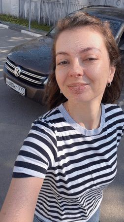 Woman takes morning selfie videos in Khimki parking lot