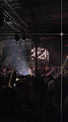 Crowded nightclub dance floor captured in Tolosa, Argentina