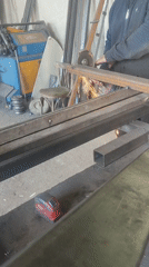 Person operates angle grinder in Burgas workshop