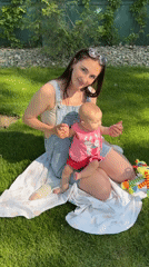 Mother and baby enjoy picnic in Krasnodar park