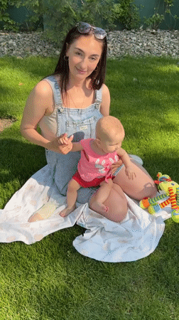 Mother and baby enjoy picnic in Krasnodar park
