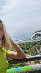 Woman poses for camera on Valencia balcony