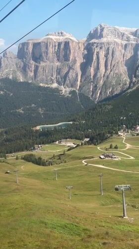 Summer morning exploring Canazei and the Dolomites by cable car and foot
