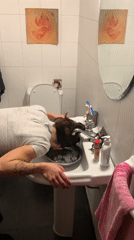 Ice water face plunge in a Buenos Aires sink