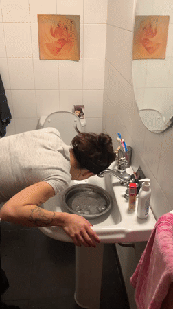Ice water face plunge in a Buenos Aires sink
