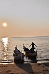 Traditional fishing boats captured at golden hour in Lhokseumawe