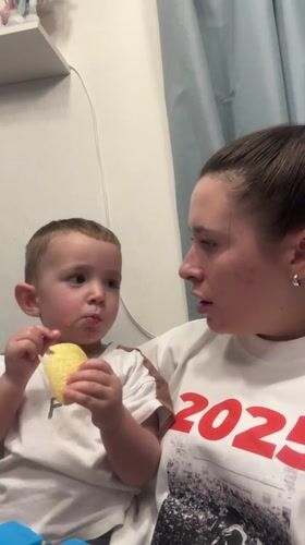 Woman and toddler share quiet moments at Odintsovo home