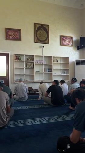 Morning prayers at a mosque in Karamanas, Uzbekistan