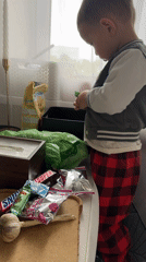 Toddler plays with toys during morning hours in Odintsovo