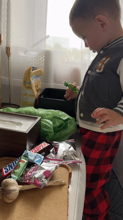 Toddler plays with toys during morning hours in Odintsovo